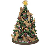 Miniature Christmas tree with golden retriever ornaments